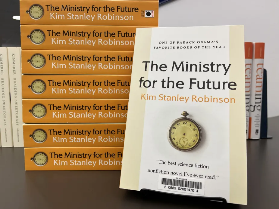 Stack of books: "The Ministry for the Future" by Kim Stanley Robinson