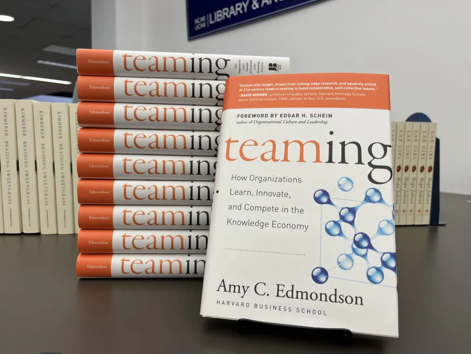 Stack of books: "Teaming" by Amy C. Edmondson